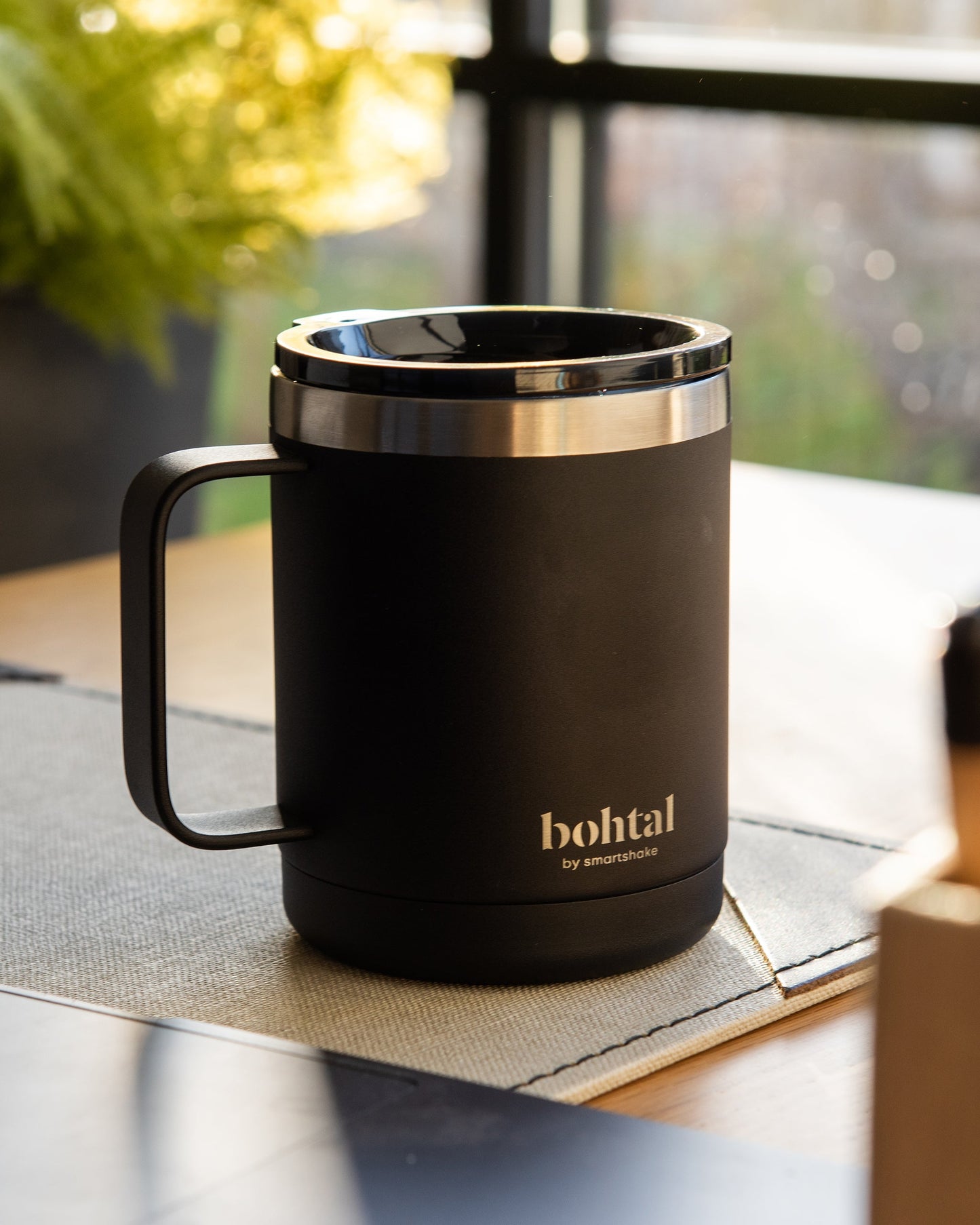 bohtal-insulated-coffee-mug-black-u5 Bohtal_Insulated_Coffee_Mug_Black_lifestyle.jpg
